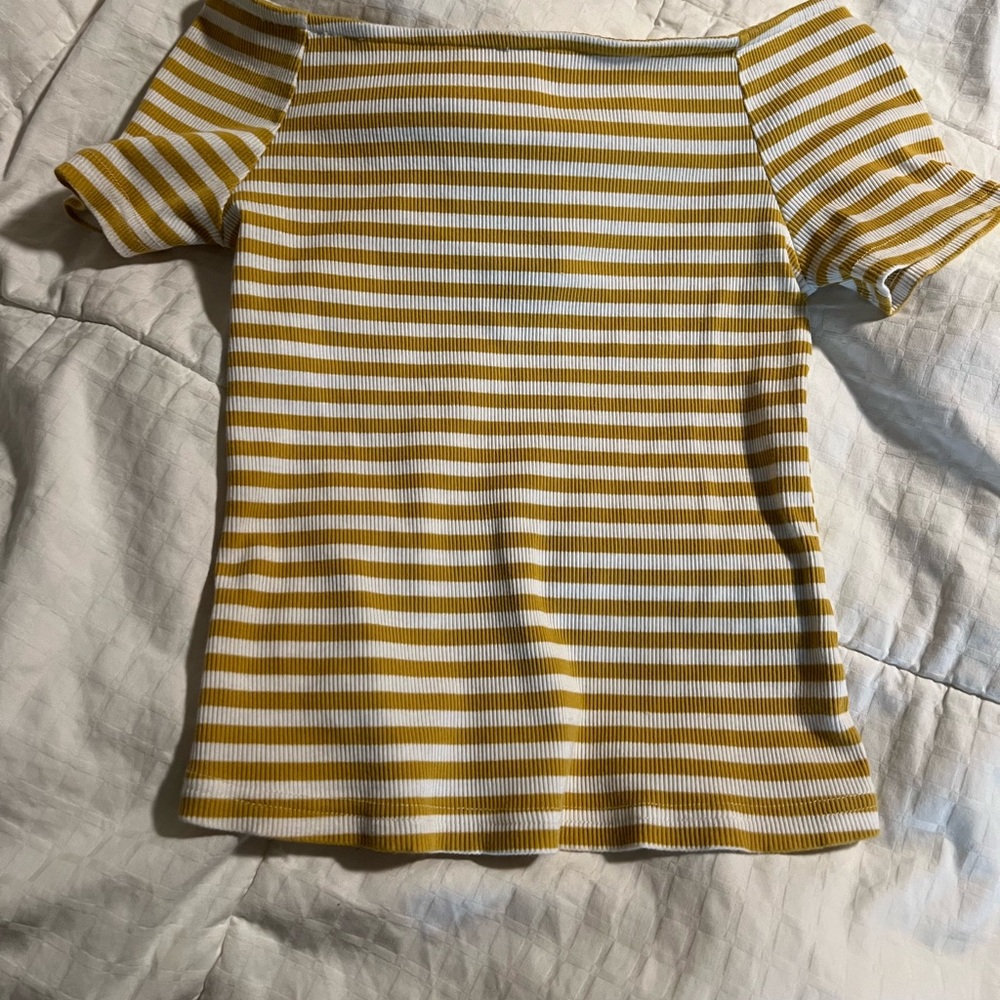 Striped T shirt with cross detail on back, boat neck.